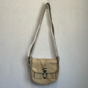Vintage Rothco Combat Tested Tan Canvas Messenger Bag Web Strap Pocket Travel